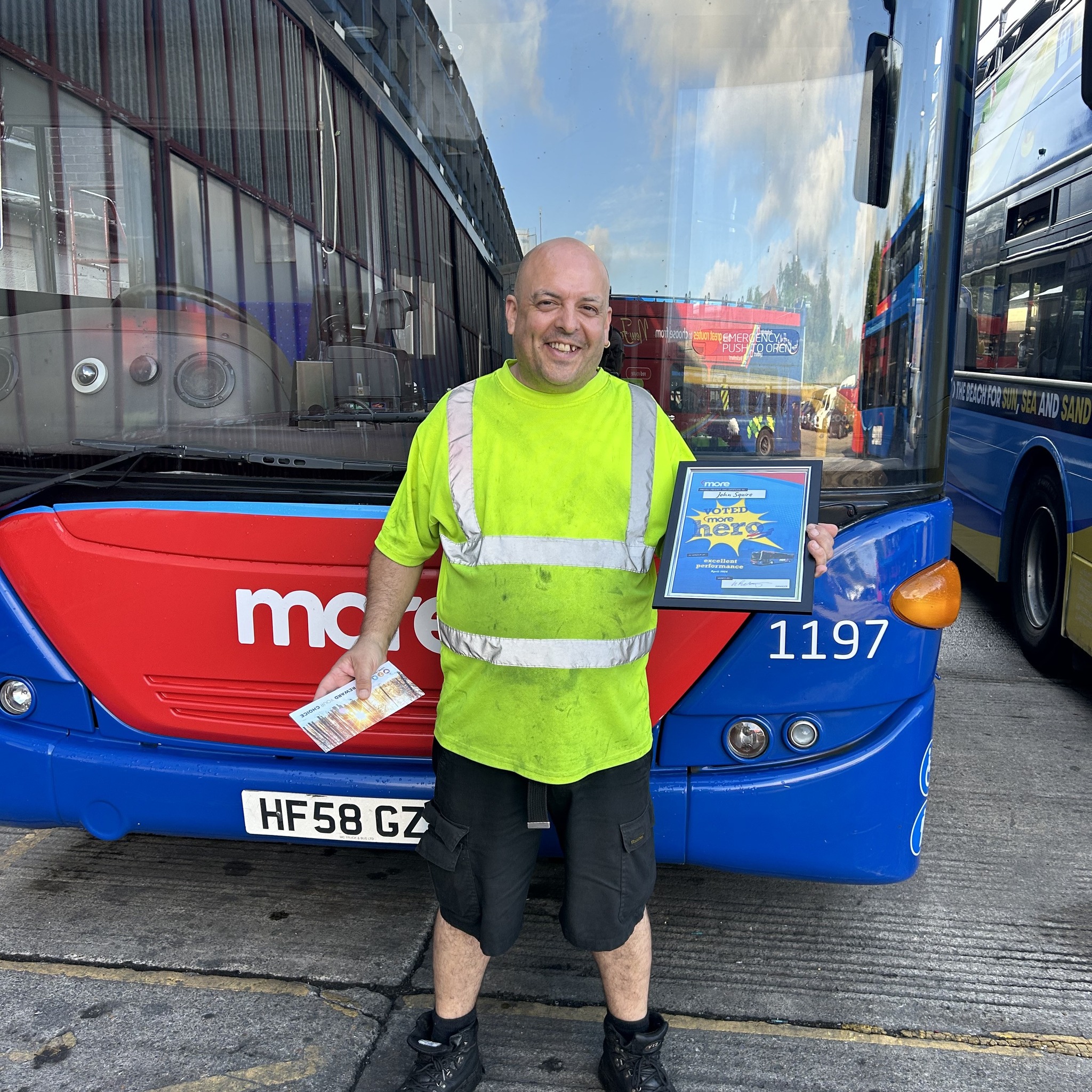 John with his more hero certificate and voucher