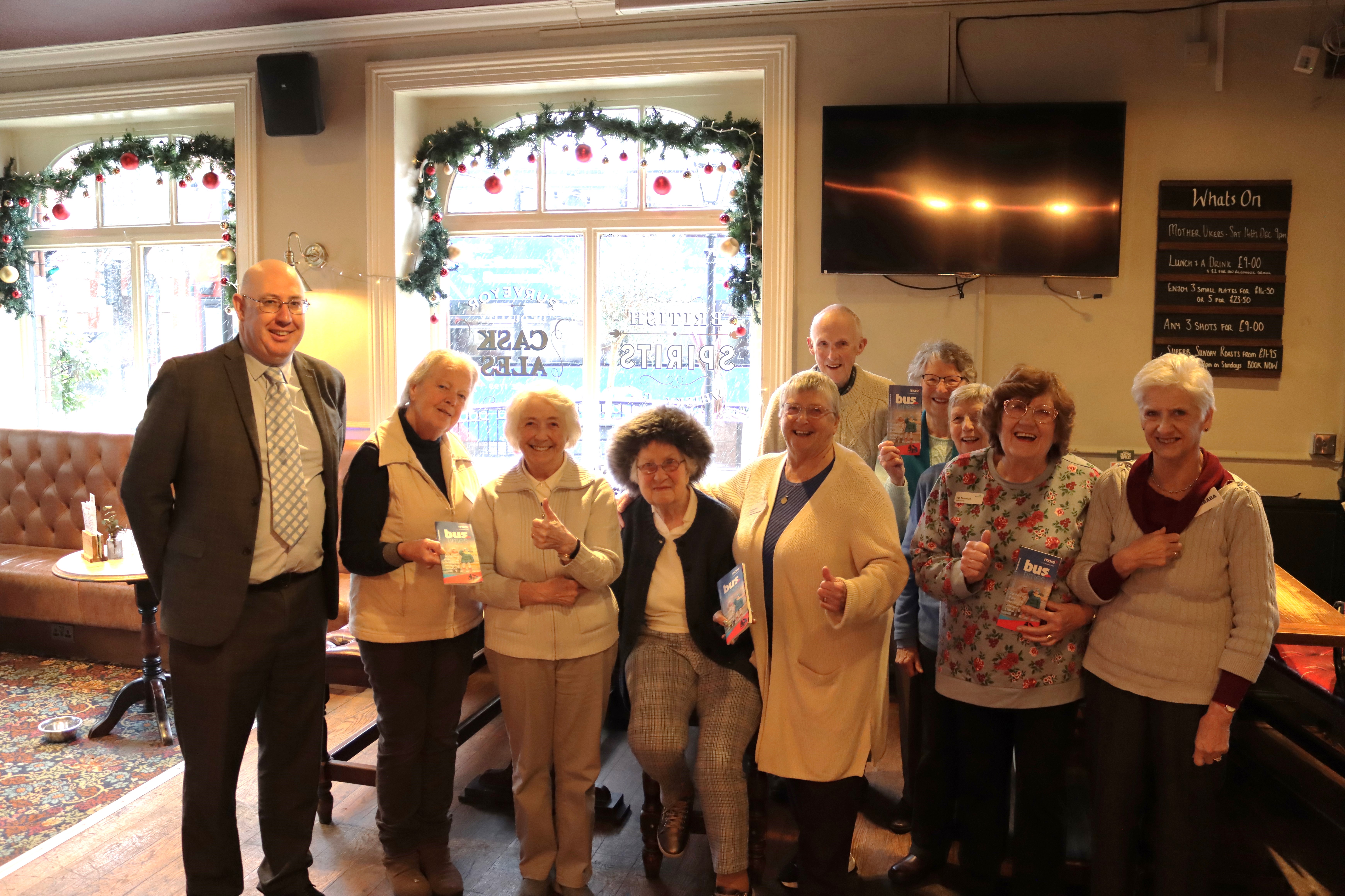 Group of Brendoncare members and volunteers with morebus general manager