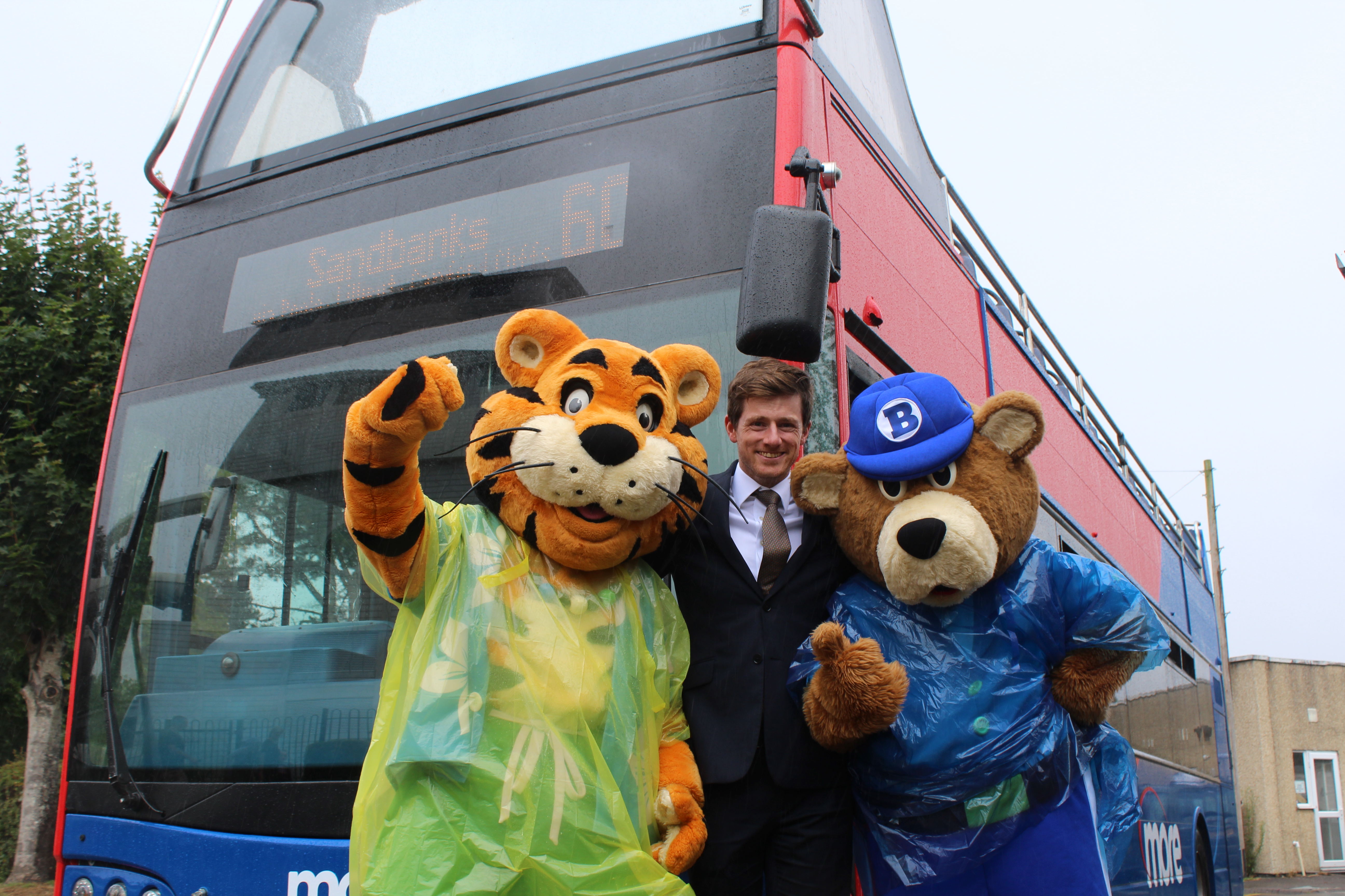 Photo of Rockley Park's Rory the Tiger and Bradley the Bear with morebus General Manager, David Heckles