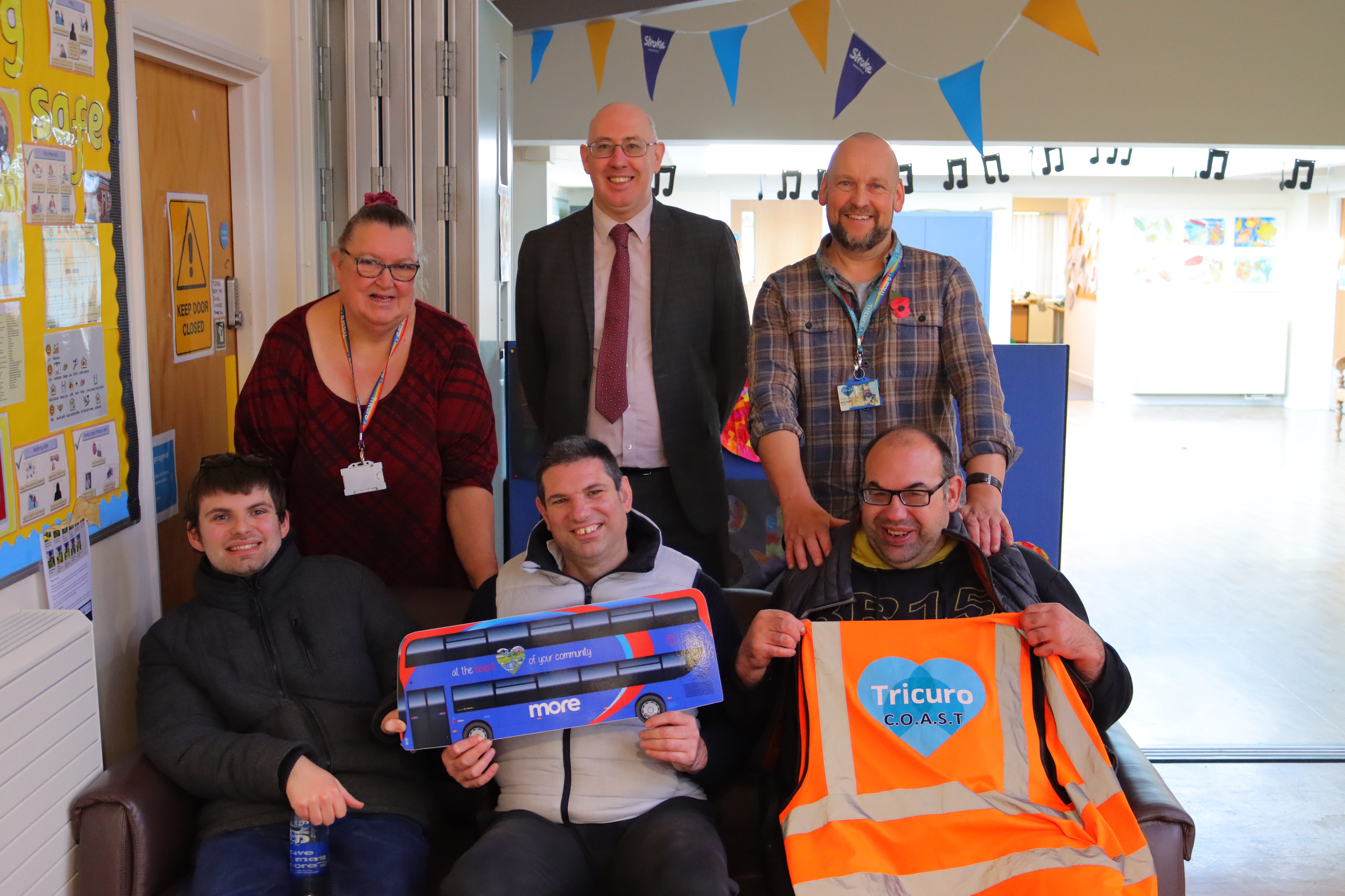 Morebus general manager with volunteers and COAST beneficiaries