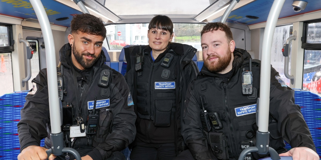Transport safety officers on a bus