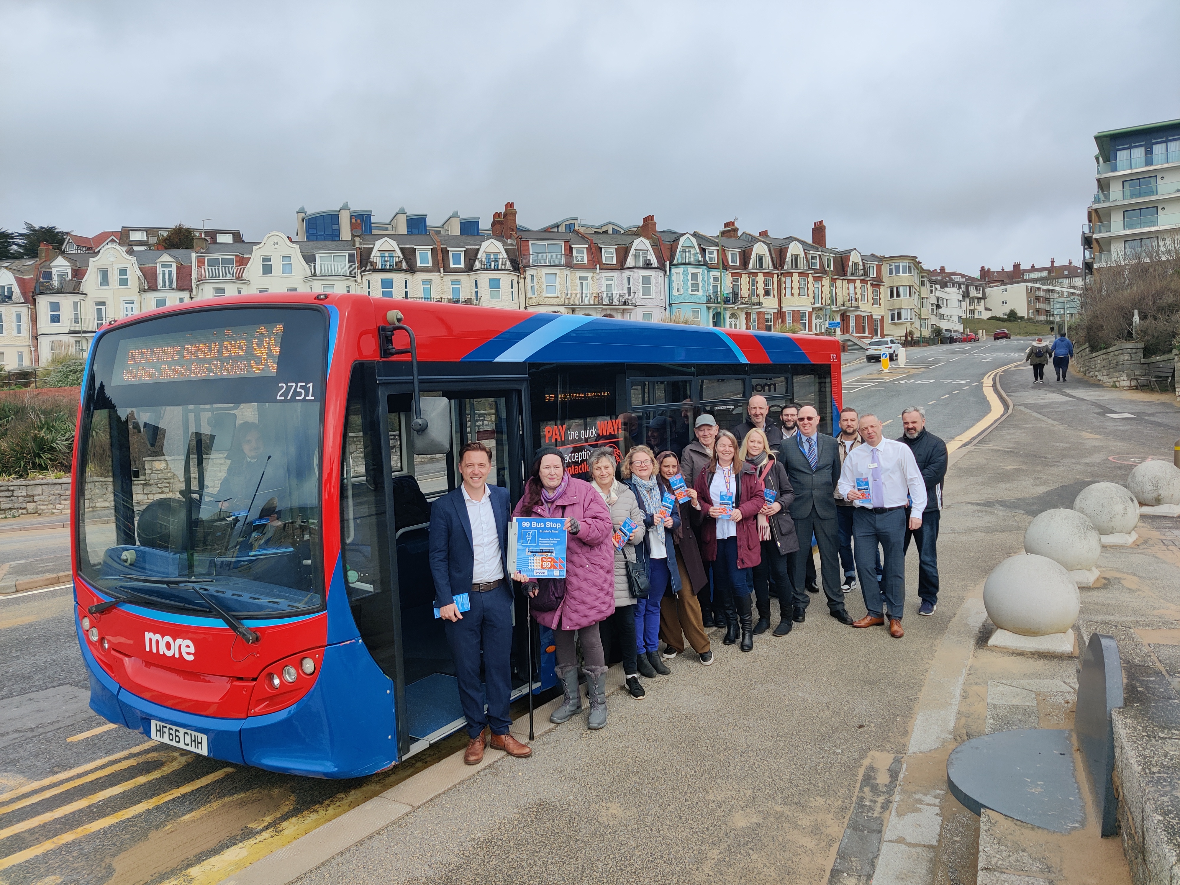 Group of reps with new 99 beach bus